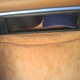 Behind driver: Hat storage shelf